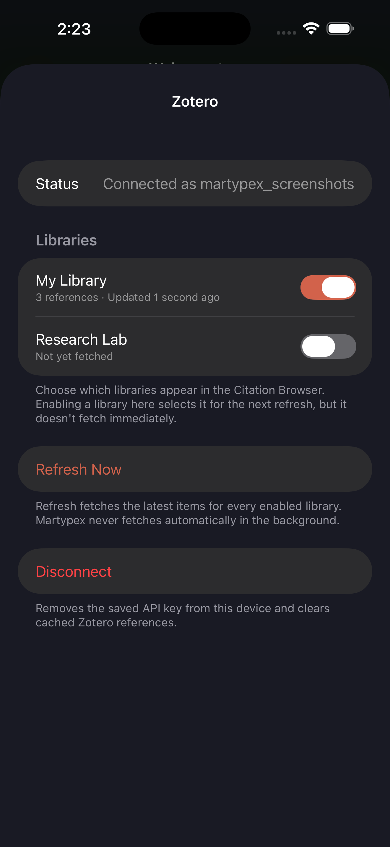 Connected Zotero account with library toggles, on iPhone, dark mode
